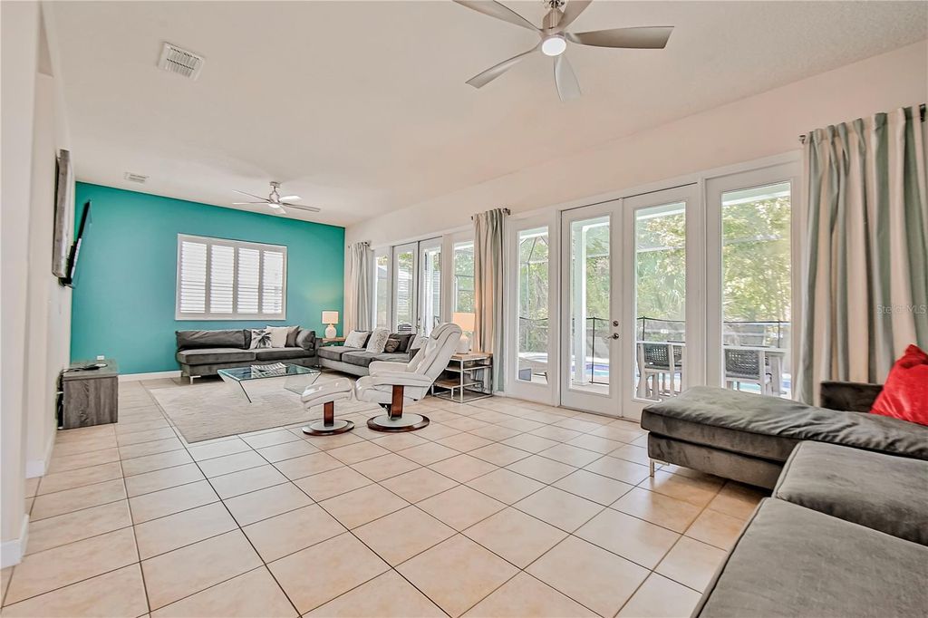 Photo of 7728 Linkside Loop, Reunion, FL 34747 (MLS # O6349105)