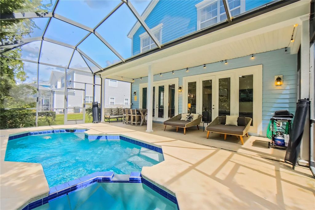 Photo of 7728 Linkside Loop, Reunion, FL 34747 (MLS # O6349105)