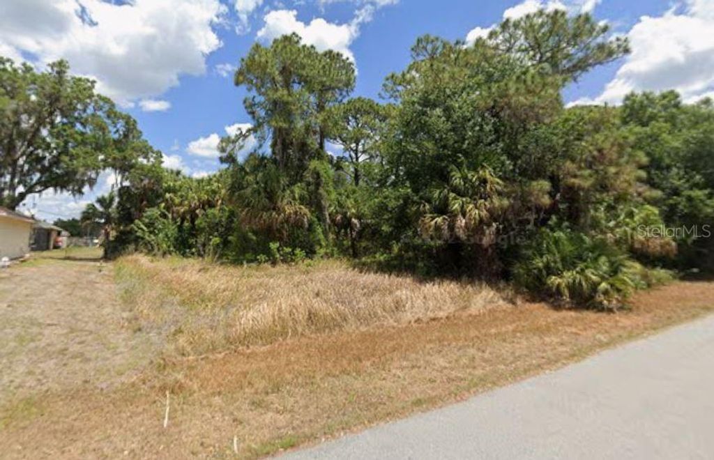 Photo of 14464 Cobb Avenue, Port Charlotte, FL 33953 (MLS # C7517187)