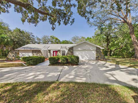 Photo of 7256 Royal Oak Drive, Spring Hill, FL 34607 (MLS # OM728660)