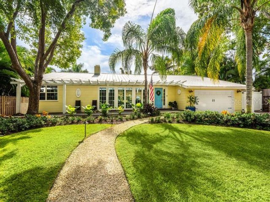 Located in the highly sought-after Avondale neighborhood, this beautiful “Old Florida” home has been extensively and tastefully updated while maintaining its timeless charm. The split floor plan includes three oversized ensuite bedrooms, an additional powder room, and a separate study/den conveniently positioned adjacent to the primary suite. Floor-to-ceiling windows and an open floor plan allow for abundant natural light and views of the heated saltwater pool, travertine deck, and generously sized backyard. Significant renovations in 2022 and 2023 include a new primary suite addition, an extensive kitchen remodel with updated electrical and plumbing, and new flooring throughout. Exterior improvements are equally impressive, featuring impact-rated doors and windows throughout, enhanced landscaping with drainage systems, irrigation, front yard fencing, and updated lighting. Additional features include a 2-car garage with epoxy flooring, metal roof (2007/2021), and newer A/C (2021). Perfectly situated between Southside Village and the vibrant Downtown Sarasota Bayfront, the property is also located within the highly sought-after Southside Elementary School District, making it a premier choice for those seeking convenience, style, and location.