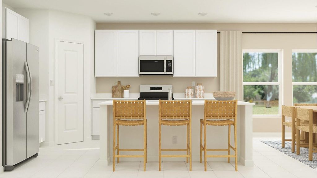 Photo of 398 Puma Loop, Groveland, FL 34736 (MLS # O6349445)