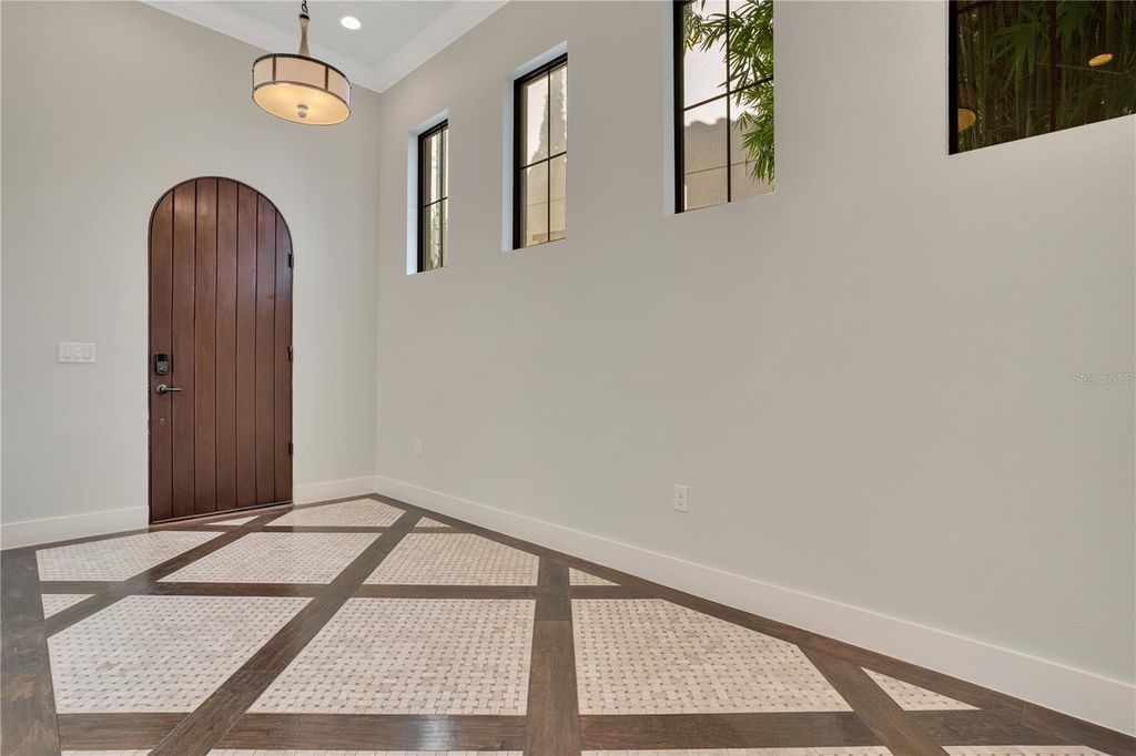 Photo of 8149 Via Vittoria Way, Orlando, FL 32819 (MLS # O6402922)