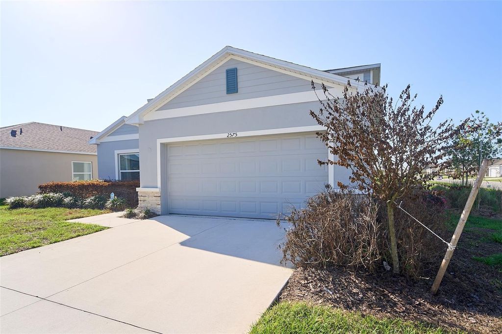 Photo of 2575 Driftwood Street, Auburndale, FL 33823 (MLS # TB8485224)