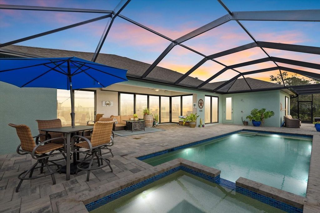 Photo of 15576 Aldama Circle, Port Charlotte, FL 33981 (MLS # A4678341)