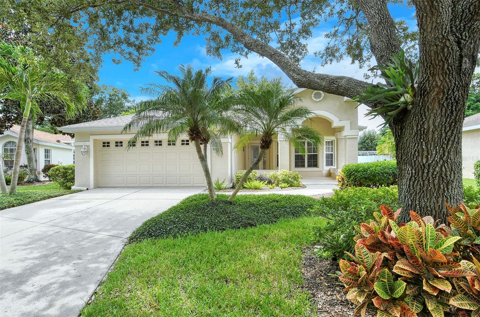 Immaculate 3 bedroom 2 baths maintenance free home in popular Pinehurst Estates in the Palm Aire area* Nestled among beautiful Oak trees on a quiet cul de sac* One of the largest homes in Pinehurst over 1900 sq. ft. under air* High ceilings, very open with skylight making it light & bright* Kitchen features creamy white wood cabinets, granite counters, new refrigerator in 2019* New roof in 2021* Ceramic tile & laminate floors, no carpeting!* Enclosed Florida room with private backyard views* Association fee includes: lawn maintenance, irrigation system maintenance, internet & cable TV, clubhouse with heated pool* Close to Palm Aire Country Club, restaurants, UTC Mall*
