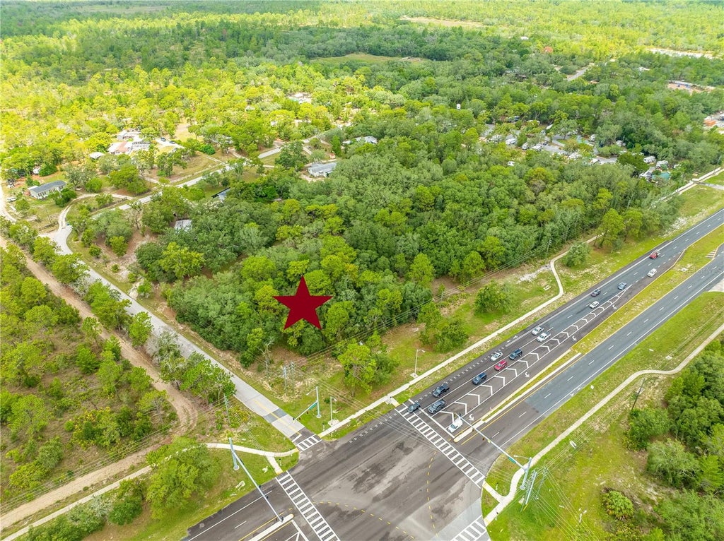 Photo of 11115 Commercial Way, Weeki Wachee, FL 34614 (MLS # W7888832)