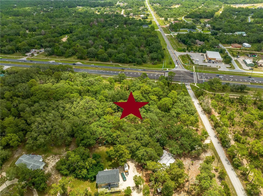 Photo of 11115 Commercial Way, Weeki Wachee, FL 34614 (MLS # W7888832)
