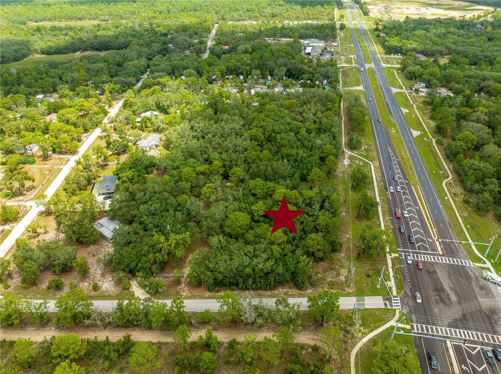 Photo of 11115 Commercial Way, Weeki Wachee, FL 34614 (MLS # W7888832)