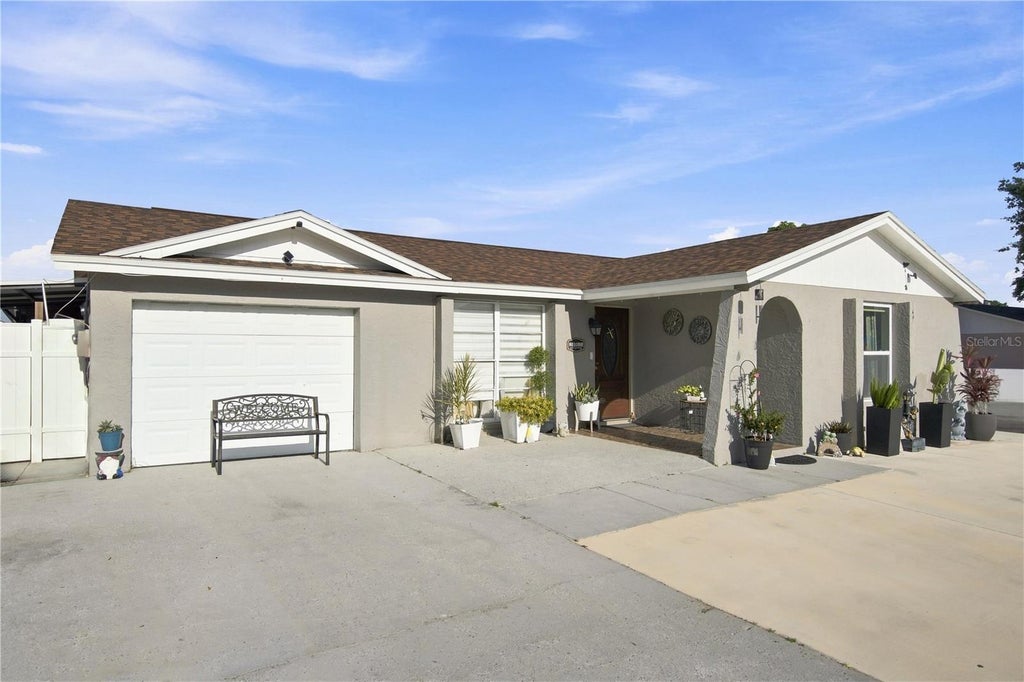 Photo of 9610 Shalimar Court, Tampa, FL 33615 (MLS # TB8554387)