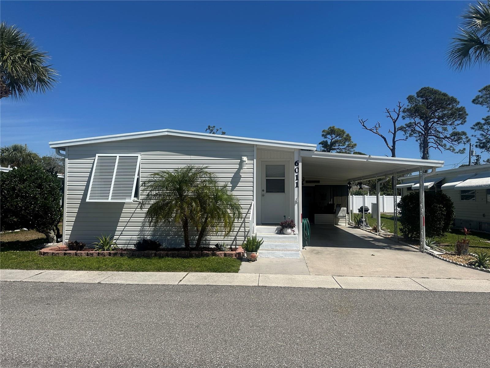 This 3 bedroom, 2 bathroom home is dog friendly and move in ready! At over 1200 square feet, this home has plenty of room for guests to visit. In 2005, the home had a major renovation including an addition to the home, new kitchen, new windows, and drywall on all walls. The home also features hurricane clips, hurricane windows, and a 4" insulated panel roof. All three bedrooms are large and the home comfortably sleeps 6, without air mattresses! Located on the perimeter of the community, the home has a private back yard. The screened porch is a wonderful addition to the home and the perfect place to enjoy the beautiful Florida weather. The home is located in Japanese Gardens, an active 55+ community located in Venice. The community if the perfect location with Manasota Beach less than 2 miles away and easy access to downtown Venice, Englewood, and Wellen Park. Japanese Gardens has many amenities including a large pool, hot tub, clubhouse, library, and courts for pickleball, bocce, and shuffleboard.