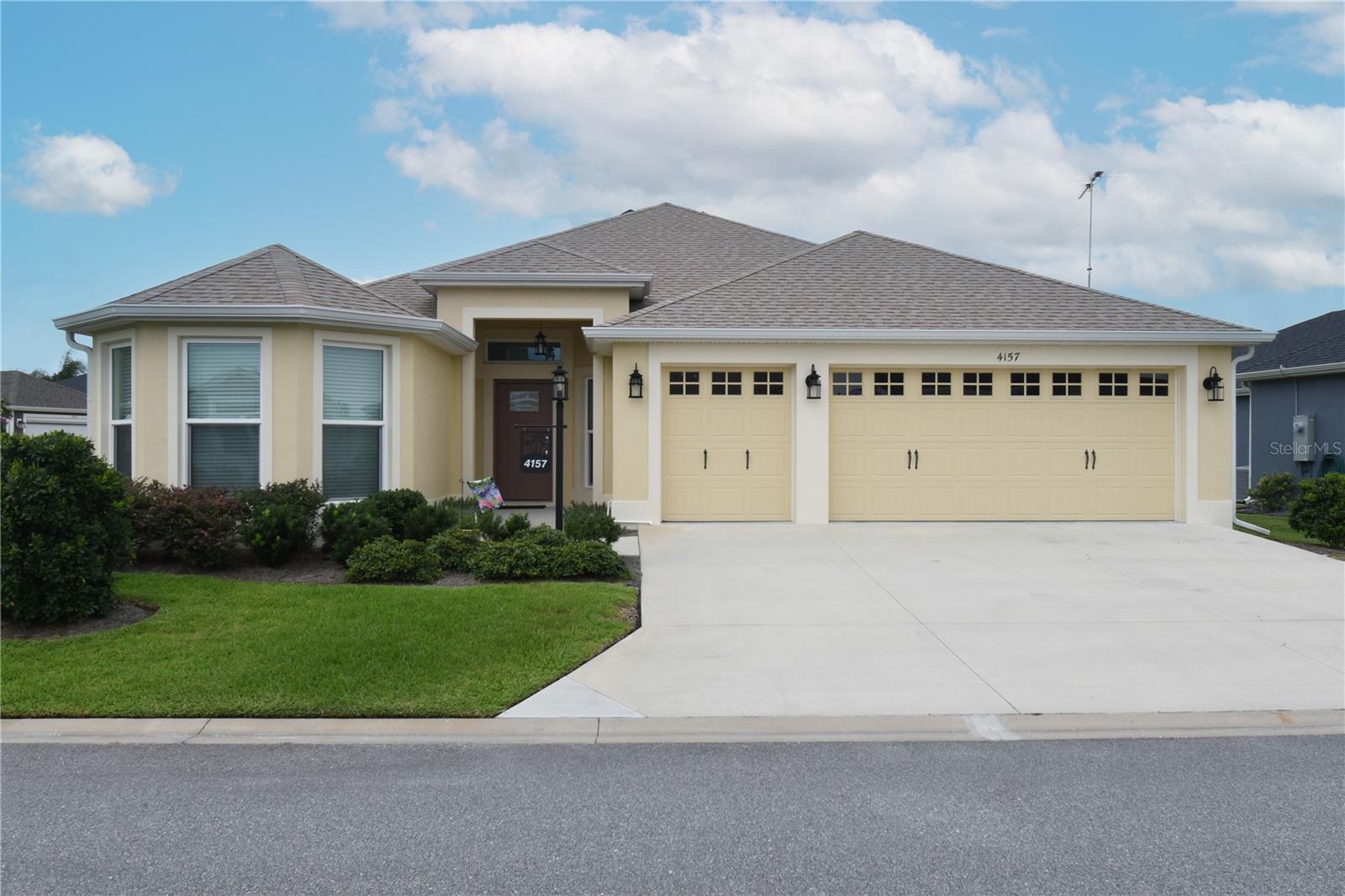 Check out this fabulous Begonia in The Village of DeLuna and priced at a price you can't refuse. This home sits on a Corner Homesite offset from the home behind it. So, there are no kissing lanais here although you can enjoy looking at the neighbor's pool as if it was your own. A 2 1/2 Car Garage will fit all your toys and take the place of that basement you would so sorely miss. High End Luxury Vinyl Planking is throughout most of the home. There are Quartz Countertops in the kitchen and bathrooms. You will love the extra space you get with the Bay Window in the front guest bedroom that you don't see anymore in the New Homes due to the mass production of homes now with poured walls. This really adds to the size of this bedroom as well as to the aesthetics of the front of this home. The location is fantastic. You are very close all kinds of amenities. Edna's On The Green provides entertainment and food close by, The Magnolia Shopping Center is only minutes away, Water Lily Recreation Center has amenities galore. The golf cart bridge over the turnpike is only minutes away by golf cart and will get you to Brownwood Paddock Square in short order. Call today to make an appointment to see this home before it is gone. You won't regret it. ( more pictures and drone shots are on the way as well as a full length video ).