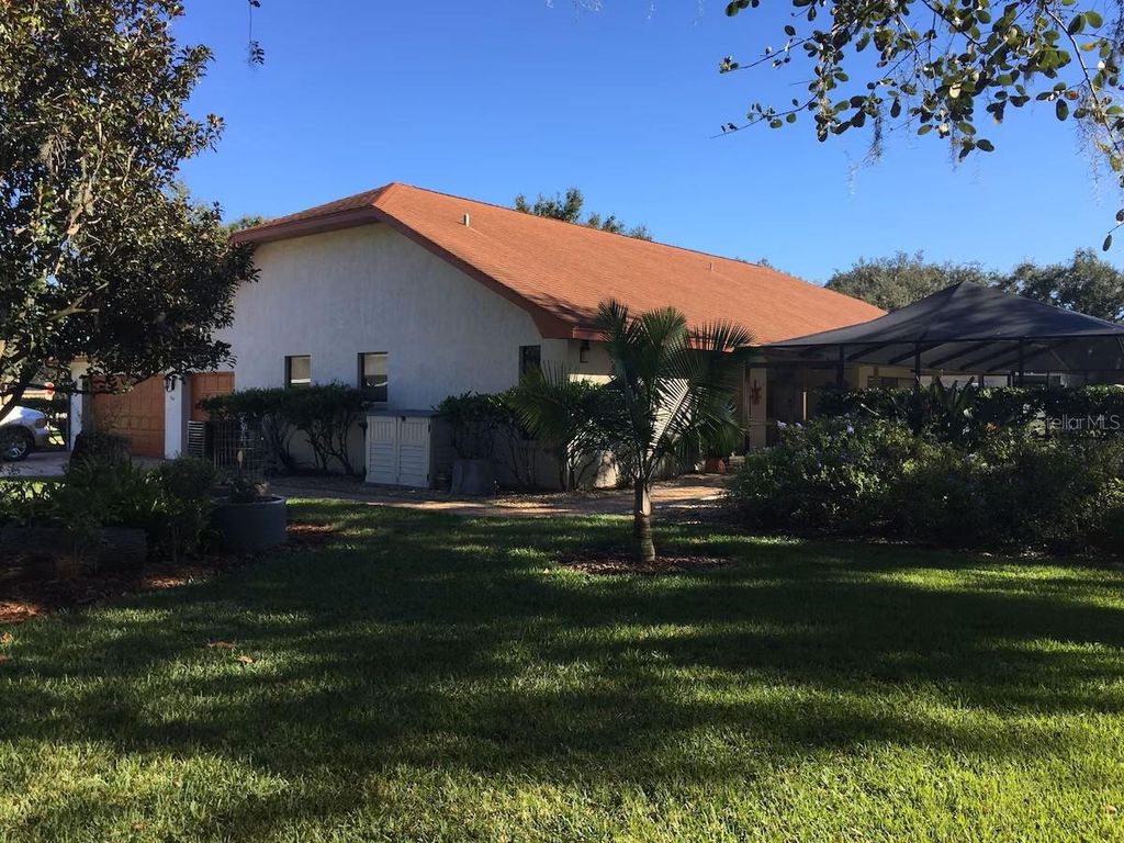 Photo of 4326 Thomas Wood Lane E, Winter Haven, FL 33880 (MLS # TB8490088)