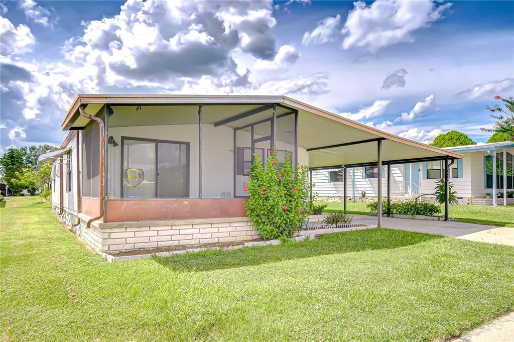 Photo of 3931 Chris Drive, Wesley Chapel, FL 33543 (MLS # TB8425420)