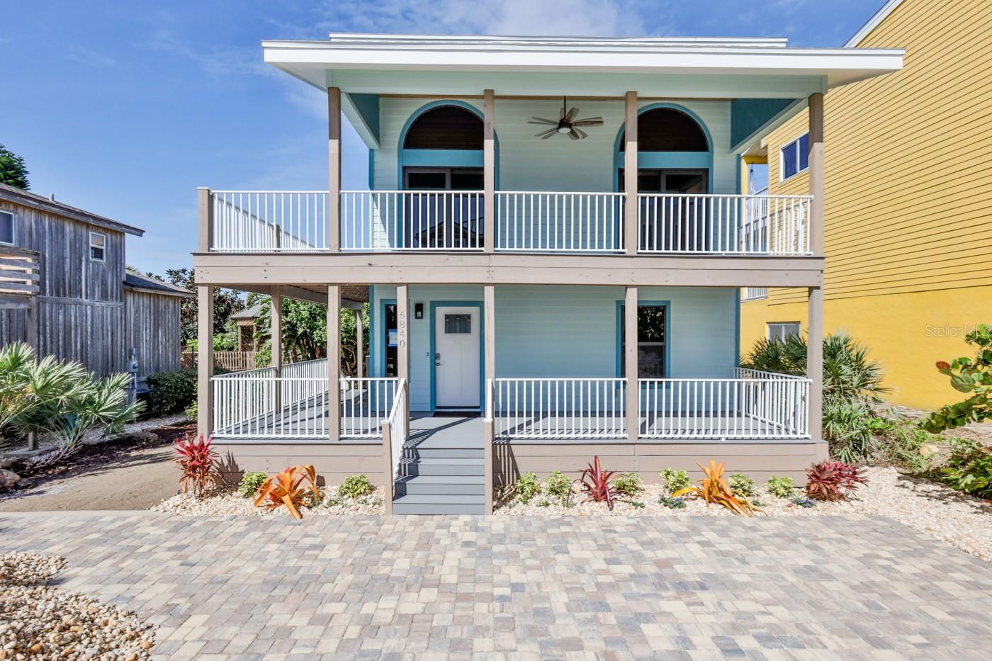 Price Reduction! Come on Home! Charming Gem with a calm, organic feel, enjoy this custom and recently renovated 2 bed 2.5 bath home in Bethune Beach! Ocean views from the main living spaces including the beautiful remodeled kitchen with quartz countertops, solid wood cabinetry, and all NEW appliances. Upgraded electrical with LED lighting and underground utilities. Master bedroom and 2nd bedroom are located on the main floor with nicely updated bathrooms. Master suite has sliders that open up to your private backyard making it a perfect place for entertaining guests, the backyard is fenced in for extra privacy and has brand new pavers! Home has wood plank porcelain tile throughout, and provides the perfect kitchen & living room layout to open up for a modern flowing floor plan. The spacious great room with soaring ceiling are bursting with natural sunlight and cool ocean breezes. Brand new impact glass sliders provide indoor/outdoor living access to your wraparound view decks. The 1st floor and 2nd floor decks have both been replaced with Trex decking and accented with aluminum powder coated railings which provides for low maintenance. Exterior of the home has brand new Hardie board siding, paint, and has all new Low-E impact windows. Hot water tank and New roof installed in March 2021, New A/C- February 2021. Situated on a large lot with lush landscaping and a paver driveway with room for boat/trailer parking and a paver patio that's perfect for outdoor entertaining. Enjoy a day in the sand with 2 beach access entries just steps away and rinse off with your private outdoor shower! Live the NSB lifestyle to the tune of crashing surf & Daily Ocean Breezes. ;Water: City
