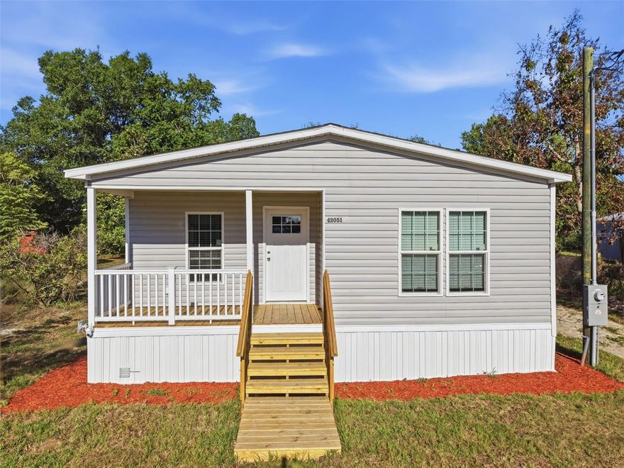 One or more photo(s) has been virtually staged. One or more photo(s) has been virtually staged. Not your average manufactured home...these homes have the WOW factor!!! SELLERS WILLING TO DO CONCESSIONS TOWARDS BUYER'S CLOSING!! Welcome to an exceptional opportunity to own a high-quality BRAND NEW Cavco Industries home, built with enhanced engineering standards and designed to withstand wind loads up to 100 MPH (Wind Zone 2 construction)—giving you peace of mind along with incredible value. Cavco received two national design awards from the Manufactured Housing Institute recognizing their continued focus on design innovation, product quality and expanding access to modern, affordable housing. For INVESTORS...NO INCOME VERIFICATION REQUIRED! For Home Buyers this home qualifies for 100% Financing USDA loan!! These homes come with a 10 yr 2-10 Warranty providing long term confidence and peace of mind. The 3 bedroom 2 bathroom split-bedroom floor plan offers privacy, with a standout primary suite that includes a luxury modern ensuite bathroom with a large walk-in shower, dual sinks and built in cabinetry. The primary also includes a ceiling fan and massive Walk-in closet for added functionality. This beautifully designed kitchen with a timeless look is the heart of the home, offering a perfect blend of style, functionality, and open-concept living. Featuring a spacious center island with bar seating, this layout is ideal for entertaining, casual dining, or gathering with family and friends. It includes Stainless steel appliances, Deep stainless steel sink with modern faucet, Recessed lighting for a clean, updated look, abundant cabinetry and plenty of counter space providing excellent storage and prep areas. Enjoy natural light pouring in through multiple windows, enhancing the bright and airy feel of the space. The open flow into the living and dining areas makes this kitchen feel expansive and connected—perfect for today’s lifestyle. Bedrooms 2 and 3 offer a peaceful and versatile space, designed with comfort and simplicity in mind. Each room features large windows that bring in the natural light, creating a bright and inviting atmosphere with neutral finishes and durable flooring throughout, making it easy to personalize the space to fit any style. The layout provides flexibility for use as bedrooms, a home office, or guest space—perfect for today’s lifestyle needs. This home is designed with the ENERGY STAR program including energy efficient windows and insulation and is situated on a 0.26 Ac lot OWNED not leased and with NO HOA and NO Floodzone!!! This home is within 20 minutes of Downtown Deland, 9 min to Ed Stone Park and Boat Ramp for the St Johns River and 30 minutes to I-4. Tucked away from the hustle and bustle, yet conveniently located near shopping, dining, and everyday amenities, this home offers the perfect balance of privacy and accessibility. Call for your private showing Today!!!