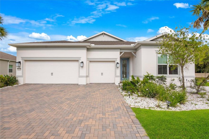Welcome to 3449 Michigan Street in the sought-after community of Lake Mary where contemporary elegance meets everyday comfort. Built in 2021 and nestled inside the gated enclave of Crestwood Estates, this 4-bedroom, 3 bath home offers nearly 3,000 square feet of thoughtfully designed living space on an oversized lot. From the moment you step through the front door, you’re greeted by soaring ceilings, natural light, and an open-concept floor plan that effortlessly blends sophistication and functionality. The gourmet kitchen features quartz countertops, stainless steel appliances, and a spacious center island perfect for entertaining, while the adjoining dining and living areas flow seamlessly onto a covered lanai overlooking the landscaped backyard. The primary suite is a true retreat, offering a spa-inspired bath with dual vanities, a walk-in shower, and a generous custom closet. Three additional bedrooms and a flexible loft space provide ample room for family, guests, or a home office. With its modern finishes, energy-efficient construction, and two-car garage, this home combines style and convenience in one of Seminole County’s most desirable zip codes—just minutes from top-rated schools, boutique shopping, and premier dining. Experience luxury living at its finest in the heart of Lake Mary.
