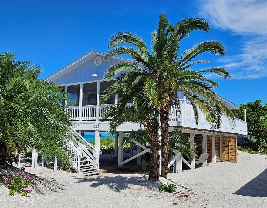 This charming 3-bedroom, 2-bath beach home is situated on Little Gasparilla Island, a unique bridgeless barrier island off the coast of the Cape Haze Peninsula. Accessible only by private boat or water taxi, the island is just a short 10-minute ride across the bay, making it an ideal location for those seeking tranquility and a true escape from the busy mainland. Relax and unwind in this peaceful retreat, where stress fades with the sound of the waves and the gentle tropical breezes. There is a community dock to use with membership and deeded beach access. The screened-in front porch offers stunning views of the beautiful blue-green waters of the Gulf, creating the perfect spot to start or end your day. Just steps away, the uncrowded beach is ideal for collecting seashells and shark’s teeth, swimming, or simply soaking up the sun with a good book. From 2025 to the present, the home has undergone several significant improvements. These include a new metal roof, installation of a new air conditioner, construction of a new storage shed under the home, new vinyl flooring, removal of popcorn ceilings in most rooms, and fresh paint inside and out. Enjoy gulf views from the kitchen, living room, and all bedrooms. Imagine waking up each morning to breathtaking views right from your bed. This home can comfortably sleep 10 people. One bedroom has a built-in murphy bed and two sets of bunkbeds. Beneath the home, there is a deck area perfect for relaxing with friends and family. Little Gasparilla Island is a true retreat, with no grocery stores, restaurants, or shops on the island itself. However, a variety of delightful dock-side restaurants are easily accessible by boat. The surrounding waters are renowned for excellent fishing, with opportunities to catch redfish, snook, snapper, trout, and more. As evening falls, neighbors often gather by the water’s edge to watch the sunset, ending another peaceful day in paradise. Discover this lovely home and embrace the unique lifestyle that island living offers. Experience the serenity, beauty, and sense of community that define life on Little Gasparilla Island.