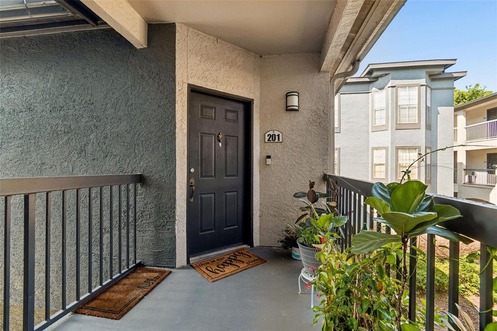 Photo of 8414 Lucuya Way #201, Tampa, FL 33637 (MLS # TB8518314)