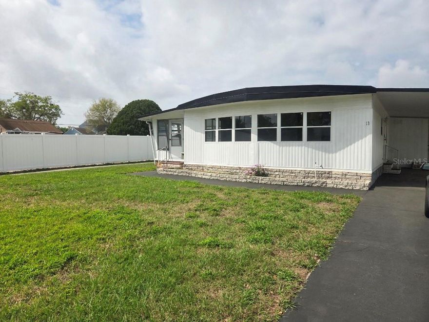 for rent. It does offer a 2 bedroom, 2 bath, with large living area and a large enclosed sunroom (porch) as well. It also has an extra large carport and utility room. You just can't beat this location,  and all the amenities this 55+ community offers and reasonable rent. The community offers a sparkling pool and clubhouse, ideal for social gatherings and recreational activities, library area, horseshoes, picnic area with grills, clubhouse kitchen, stage for entertainment, card room, billiards, shuffleboard, and more!! This is a Golf Cart Community too. Located along the shores of Lake Tarpon, a sprawling 2500-acre lake, outdoor enthusiasts will delight in the community boat ramp and dock providing direct access to boating, fishing, and water sports. This is what the Florida lifestyle is all about. Many club activities too as there are always many posted on the board. Experience the vibrancy of this active community, where there's always something exciting to do and friendly faces to meet. Location is great and near everything including restaurants, beaches, and medical, restaurants etc.  ps new roof, driveway resurfaced, bew luxury vinly flooring, s/s appliances and more.