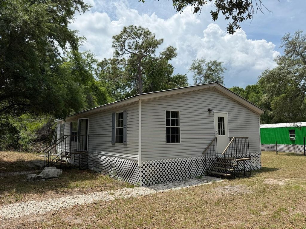 Photo of 10405 Jungle Street, New Port Richey, FL 34654 (MLS # TB8530881)