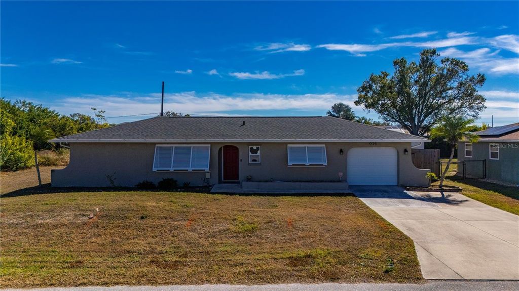 Photo of 915 Fairfax Terrace NW, Port Charlotte, FL 33948 (MLS # C7520484)