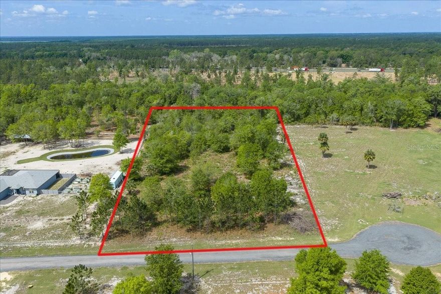 Welcome to Coyote Run! Conveniently located near Hwy 301 and across from Lake Jeffords, in the lake community of Hawthorne lies this nicely wooded 5 acre open builder parcel ready for your new home. Coyote Run is a 12 lot gated development featuring paved roads with an abundance of large oaks and natural Florida vegetation. The development has no HOA in place and Clay Electric is the utility provider. Lots will need well & septic and internet service is available in the area. Take advantage of this once in a lifetime opportunity!