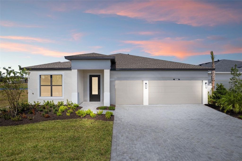 Photo of 14444 Woodland Preserve Trail, Parrish, FL 34219 (MLS # O6355376)