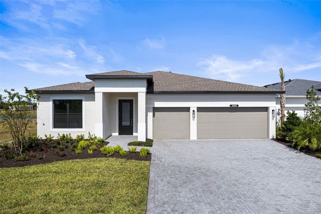 Photo of 14444 Woodland Preserve Trail, Parrish, FL 34219 (MLS # O6355376)