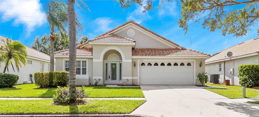 REMODELED home in GATED COMMUNITY - This waterfront DR PHILLIPS home is waiting for you.  Completely remodeled baths, kitchen, flooring and more - clean bright and ready for you to call it your home.