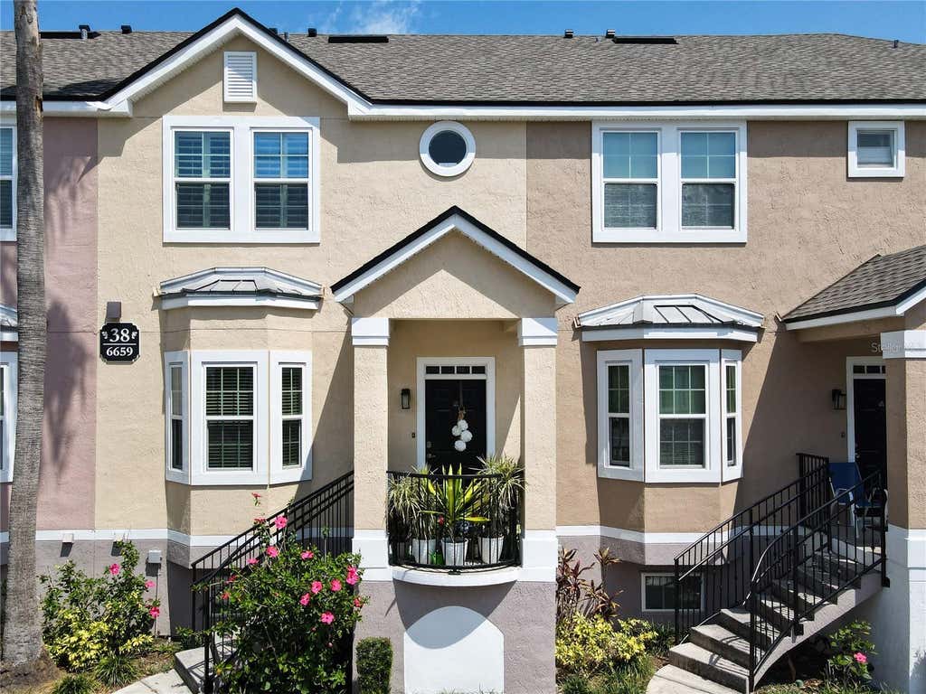 Photo of 6659 Time Square Avenue #103, Orlando, FL 32835 (MLS # S5154858)