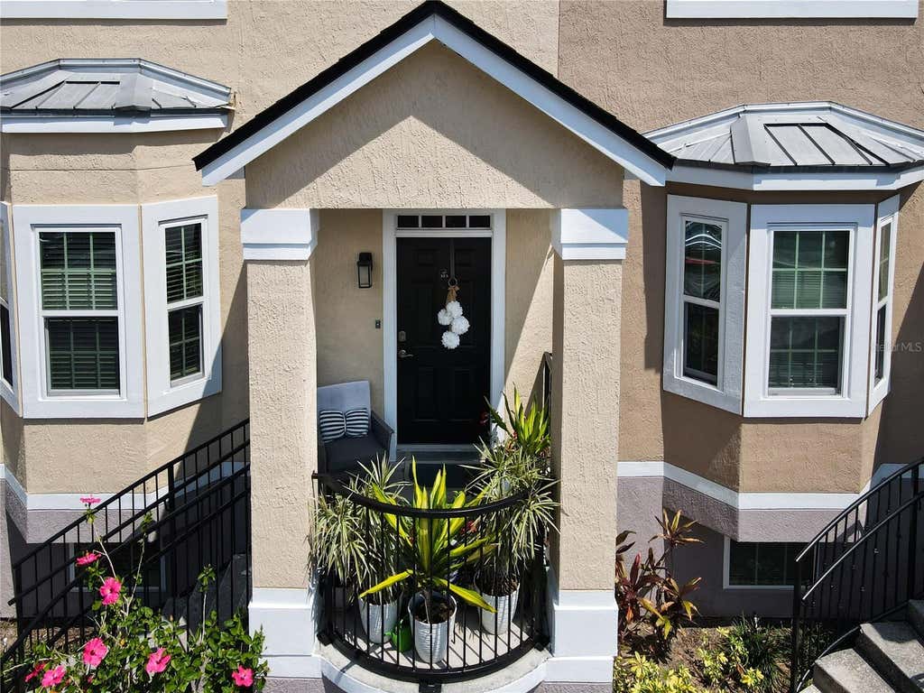 Photo of 6659 Time Square Avenue #103, Orlando, FL 32835 (MLS # S5154858)