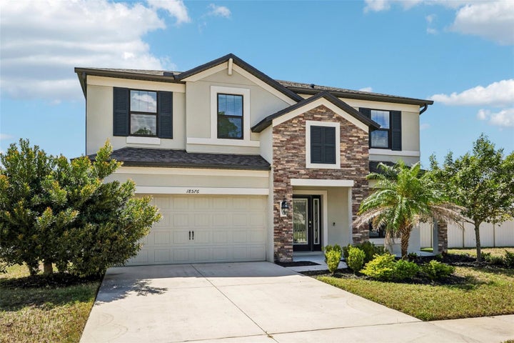 Photo 1 of 65 — 18576 OBREGAN DRIVE, SPRING HILL, FL 34610