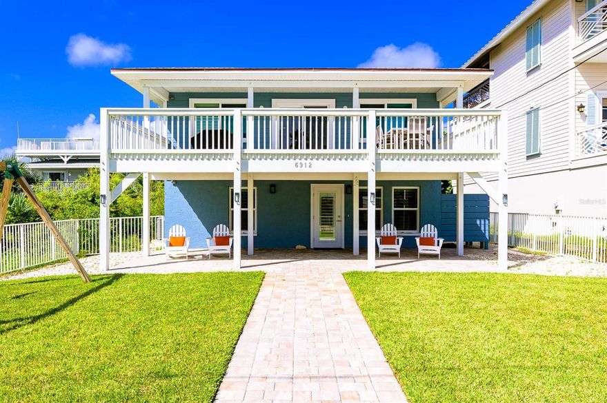 Luxury touches with a laid back style.. this beautifully remodeled beach house has it all. In addition to its immaculate design, it has a double lot, directly across the street from the beach in the quiet end of Bethune beach. Two bedrooms/Two baths with open concept living/dining upstairs, and One bedroom/One bath and Family Room downstairs. A thoughtfully planned eat-in kitchen with quartz counters and glass tile choices that impress joins the beach-style casual living space that flows to outdoor dining on the large upstairs deck. Outdoor areas easily accommodate large groups with the enclosed private yard, and a large outdoor deck for dining. With a living room upstairs and the comfy family room downstairs, there's plenty of room for all to enjoy. A beautifully appointed master suite has custom lighting and double closets. It adjoins an equally impressive master bath with its dual sink marble vanity and beautiful walk-in shower. The downstairs bedroom functions as a bunk-room and can easily be converted to a ground-floor second master enjoying a double sink bath with more gorgeous tile finishes. NEW in 2018: Appliances/Electrical/Plumbing/AC/Garage doors/Sliders. This home has many extras including energy efficient windows, impact sliders, irrigation, USB plugs, and louvered closets. As turnkey as they come, avoid the hassle of a remodel and enjoy your new custom beach house.. come see this beauty and make it your own today! ;Water: City