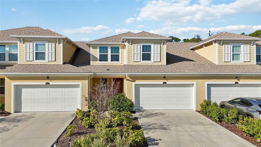 Welcome to this charming and highly sought-after Sandbar 2 townhome by Mattamy Homes, located in the desirable community of Harmony at Lakewood Ranch. This thoughtfully designed residence offers 3 bedrooms plus a loft, 2.5 baths, and an additional 12' x 10' storage room, providing a potential for a 4th bedroom, home office, game room, or flex space.

Upon entry, soaring vaulted ceilings reaching up to 15 feet immediately enhance the open-concept layout, creating a bright and airy living environment. The home features carefully selected finishes throughout, including quartz countertops, laminate flooring, 8-foot interior doors, and 7" x 22" wood-look tile on the main level.

The kitchen blends sophistication and functionality with quartz countertops, tile backsplash, 42" staggered cabinetry, stainless steel appliances, and a striking custom board and batten accent wall. The spacious primary suite offers luxury vinyl flooring, an expansive walk-in closet, and an elegantly finished primary bath featuring dual-sink quartz vanity and a tiled shower.

Upstairs, you’ll find two secondary bedrooms, a full bath, a versatile loft, and the additional 12' x 10' bonus/storage room, ideal for work-from-home needs or additional entertainment space. A 2-car garage completes the home.

Residents of Harmony enjoy resort-style amenities, including a heated pool, outdoor grilling area, fitness center, playground, and pet-friendly walking trails woven throughout the community, making it ideal for active lifestyles and pet owners alike.

Conveniently located near The Green at Lakewood Ranch, you’ll have easy access to popular dining, bakeries, coffee shops, shopping, fitness centers, spa, medical offices.

Schedule your private showing today and experience the best of Lakewood Ranch living.