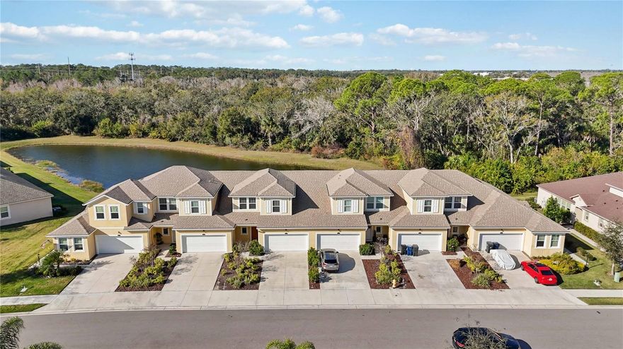 Welcome to this charming and highly sought-after Sandbar 2 townhome by Mattamy Homes, located in the desirable community of Harmony at Lakewood Ranch. This thoughtfully designed residence offers 3 bedrooms plus a loft, 2.5 baths, and an additional 12' x 10' storage room, providing a potential for a 4th bedroom, home office, game room, or flex space.

Upon entry, soaring vaulted ceilings reaching up to 15 feet immediately enhance the open-concept layout, creating a bright and airy living environment. The home features carefully selected finishes throughout, including quartz countertops, laminate flooring, 8-foot interior doors, and 7" x 22" wood-look tile on the main level.

The kitchen blends sophistication and functionality with quartz countertops, tile backsplash, 42" staggered cabinetry, stainless steel appliances, and a striking custom board and batten accent wall. The spacious primary suite offers luxury vinyl flooring, an expansive walk-in closet, and an elegantly finished primary bath featuring dual-sink quartz vanity and a tiled shower.

Upstairs, you’ll find two secondary bedrooms, a full bath, a versatile loft, and the additional 12' x 10' bonus/storage room, ideal for work-from-home needs or additional entertainment space. A 2-car garage completes the home.

Residents of Harmony enjoy resort-style amenities, including a heated pool, outdoor grilling area, fitness center, playground, and pet-friendly walking trails woven throughout the community, making it ideal for active lifestyles and pet owners alike.

Conveniently located near The Green at Lakewood Ranch, you’ll have easy access to popular dining, bakeries, coffee shops, shopping, fitness centers, spa, medical offices.

Schedule your private showing today and experience the best of Lakewood Ranch living.