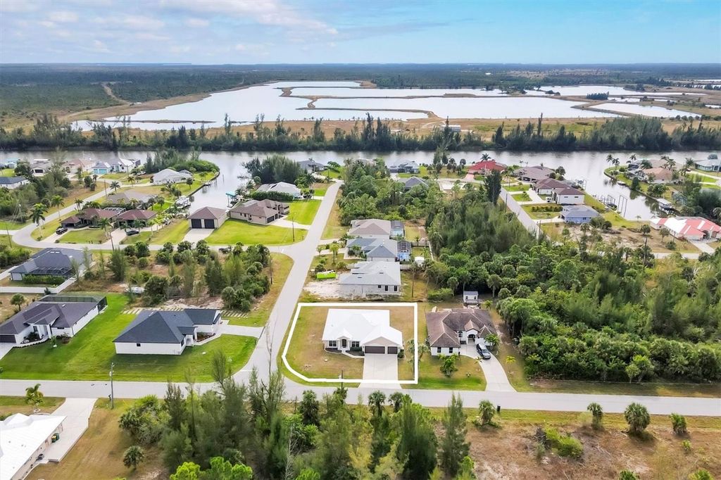 Photo of 15117 Lyneburg Avenue, Port Charlotte, FL 33981 (MLS # D6145177)