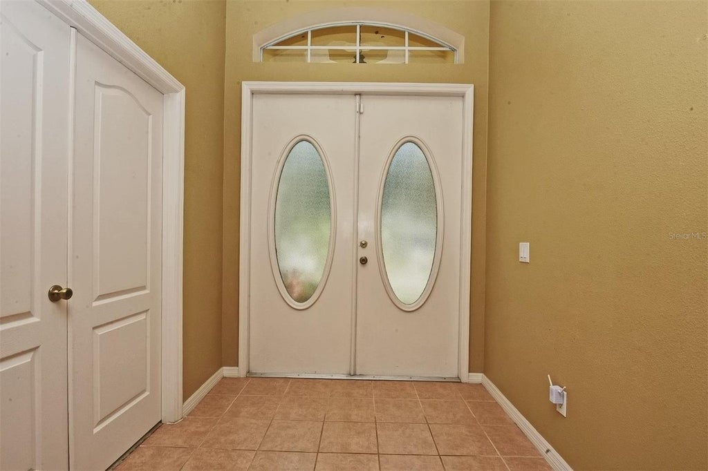 Photo of 5911 Winchester Isle Road, Orlando, FL 32829 (MLS # O6439655)