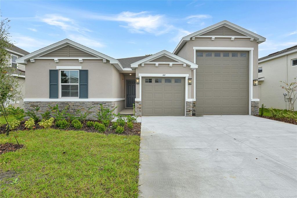 Photo of 160 Waterstone Loop, Tavares, FL 32778 (MLS # S5131866)