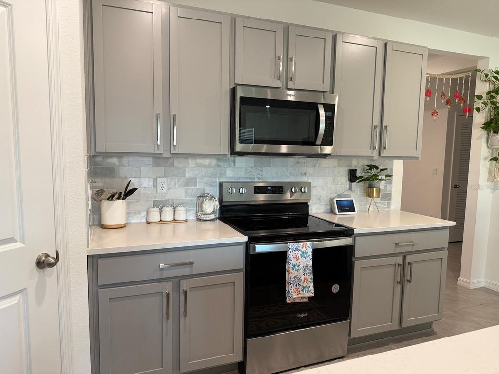 Photo of 6009 Wandering Willow Dr, Wesley Chapel, FL 33545 (MLS # O6363946)