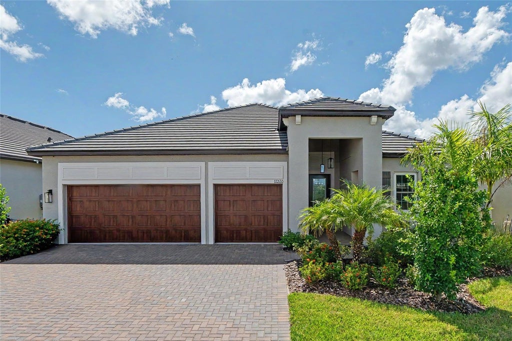 Photo of 12220 Violet Jasper Drive, Parrish, FL 34219 (MLS # TB8550712)