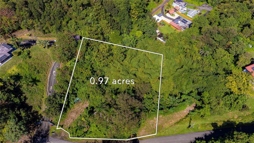 One or more photo(s) has been virtually staged. Fractional Ownership. Located in the exclusive gated community of Haciendas del Dorado in Toa Alta, Puerto Rico, this 1-cuerda lot (approximately 0.971 acres, 3,930 square meters, or 42,076 square feet) offers a prime opportunity for residential development in a secure and serene environment. Strategically positioned with excellent accessibility, the property is just minutes from PR-22 (José de Diego Expressway), which connects San Juan to the northwestern municipalities, PR-2, a major route providing direct access to essential services and commercial hubs, and PR-165, enhancing connectivity to key areas. The community offers a tranquil setting with upscale surroundings while maintaining close proximity to Dorado Beach (15 km, 20 minutes), San Juan (30 km, 35 minutes), and Luis Muñoz Marín International Airport (40 km, 45 minutes). With its ideal location and easy access to major highways, this property presents an exceptional opportunity for those looking to invest in a premium residential area.