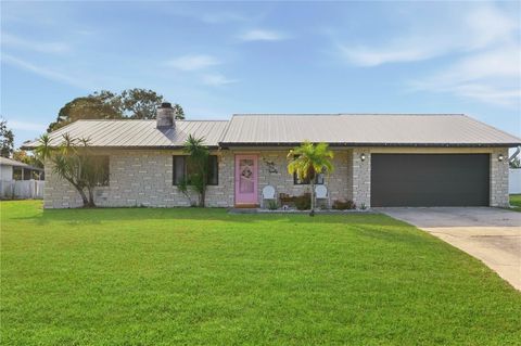 Photo of 3220 Queen Palm Drive, Edgewater, FL 32141 (MLS # V4946077)