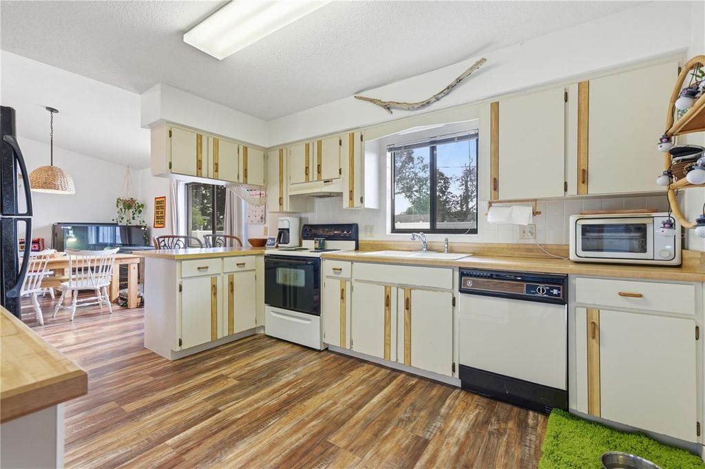 Photo of 3220 Queen Palm Drive, Edgewater, FL 32141 (MLS # V4946077)