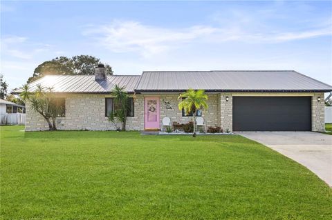 Photo of 3220 Queen Palm Drive, Edgewater, FL 32141 (MLS # V4946077)