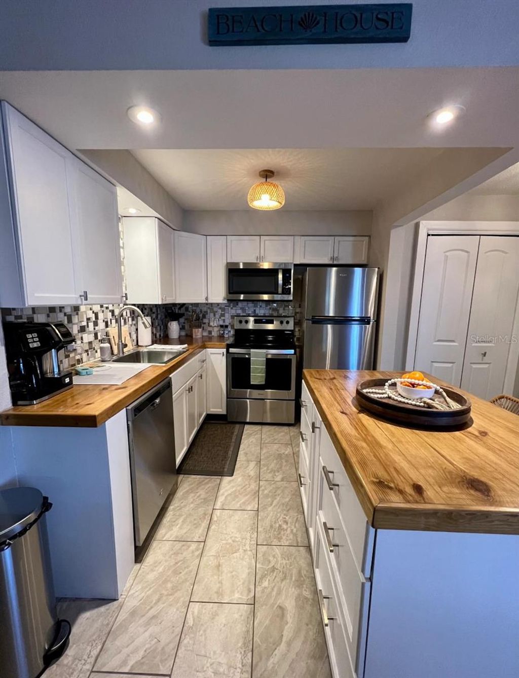 Photo of 3150 N Atlantic Avenue #20-220, Cocoa Beach, FL 32931 (MLS # TB8440760)