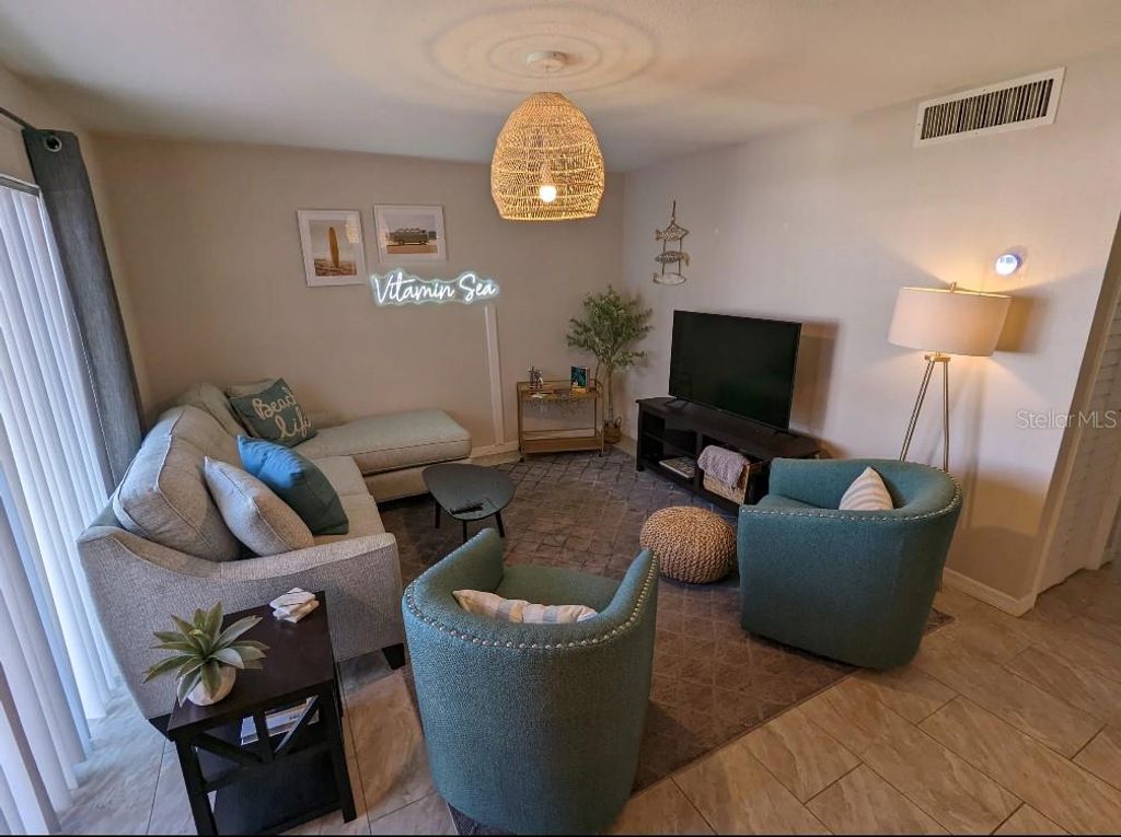 Photo of 3150 N Atlantic Avenue #20-220, Cocoa Beach, FL 32931 (MLS # TB8440760)
