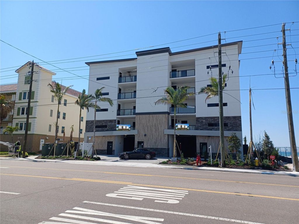 Photo of 14048 Gulf Boulevard #402, Madeira Beach, FL 33708 (MLS # U8210139)