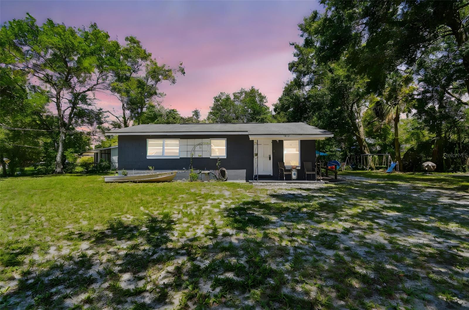 This charming 3-bedroom, 1-bath corner-lot home has been beautifully updated with newer flooring, kitchen, bathroom, and laundry room. The HVAC system has also been upgraded for year-round comfort in the last few years. Enjoy plenty of parking space for a boat, RV, or trailer—no HOA restrictions.Located just minutes from downtown Mount Dora, you’ll have easy access to lakeside dining, unique shops, art galleries, trails, boating, fishing, and local events. Convenient to parks, marinas, and Renninger’s Flea Market & Antique Center, this home combines comfort with a prime location. Come see it today!