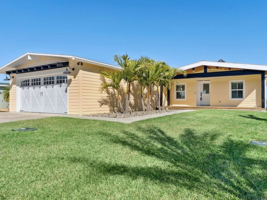 Photo of 341 Marsh Landing Loop, Oak Hill, FL 32759 (MLS # O6378217)